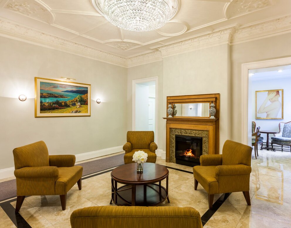 Fireplace sitting area in lobby at our montreal hotel